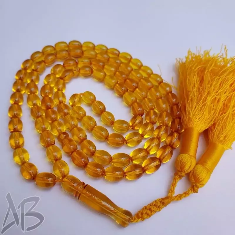 تسبیح سندلوس صد دانه (101 دانه) زردبودار تراش تخم مرغی سندانی کد 884 آقابزرگ