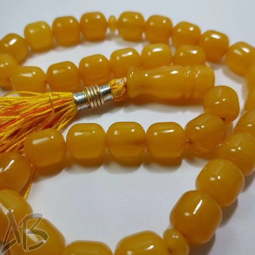 تسبیح سندلوس 33 دانه بودار تراش استوانه ای زرد کهربایی خوش تراش کد 831 آقابزرگ