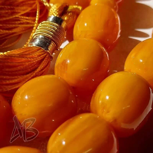 تسبیح سندلوس 33 دانه کد 962 بودار تراش برمیلی لبه گرد زرد بسیار زیبا آقابزرگ