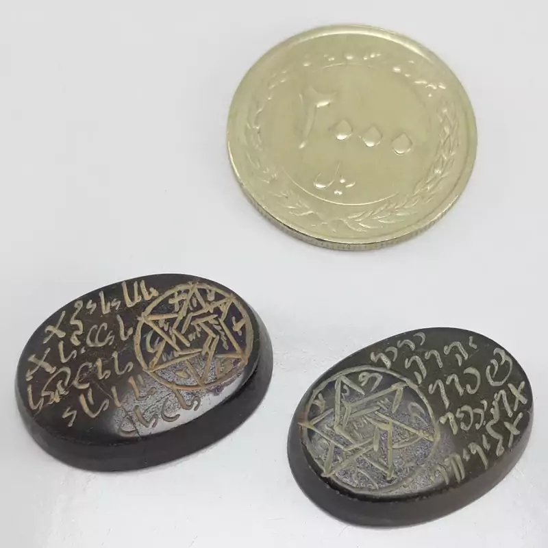یک جفت نگین حدید با ستاره داوود
