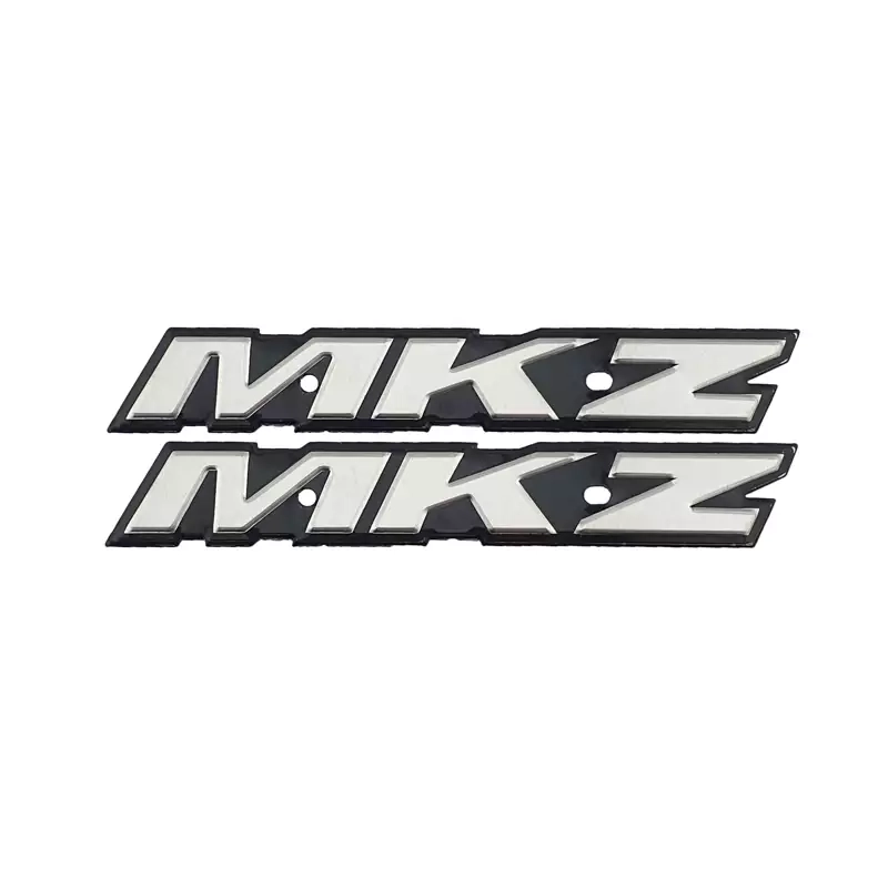 آرم فلزی باک موتورسیکلت ام کا زد رنگ نقره ای MKZ