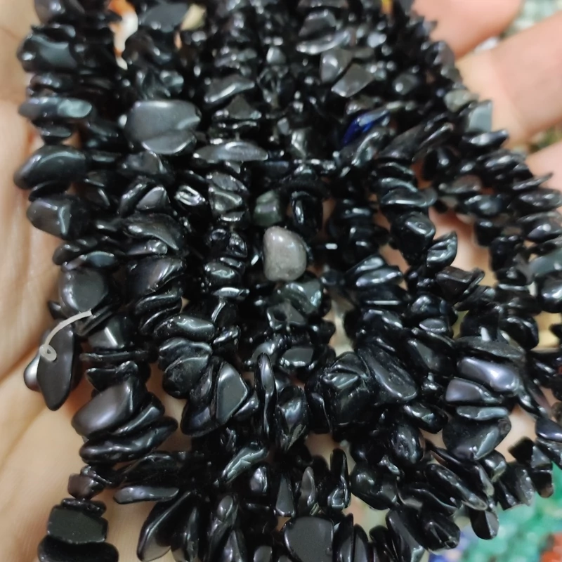 مهره عقیق سیاه دفرمه طبیعی و معدنی