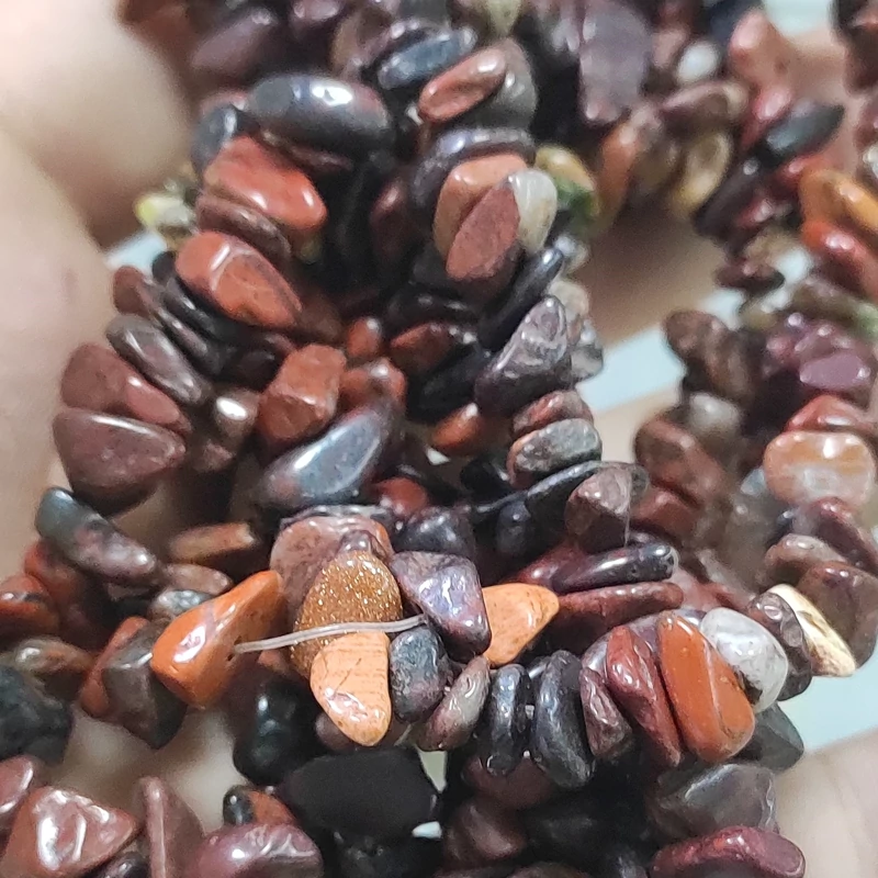 مهره سنگ خون سرخ اصل معدنی دفرمه طبیعی