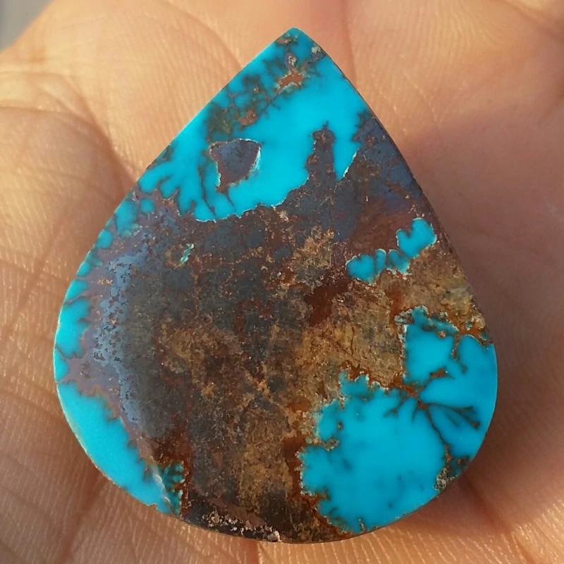 فیروزه نیشابور نگین غولپیکر فیروزه آبی محک اصل نیشابور تراش فانتزی بسیار درشت خوش رنگ بسیار فاخر100 در100 طبیعی