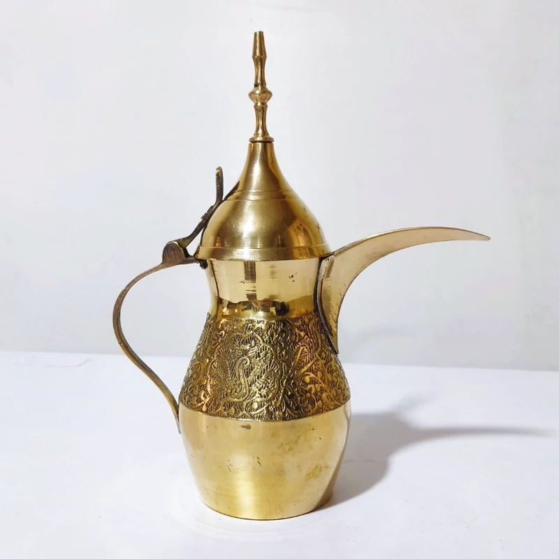 دله عربی برنجی دله برنجی هندی با ارتفاع 22 سانت قهوه جوش برنجی برنزی هندی با طرح طاووس و مناسب استفاده دائم قابل شستشو