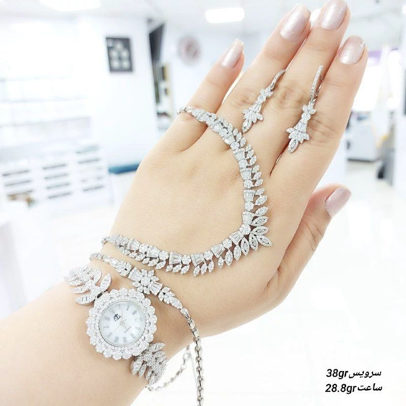 سرویس نقره زنانه طرح برگی با عیار 925 و آبکاری طلا سفید و ساعت ژاپنی
