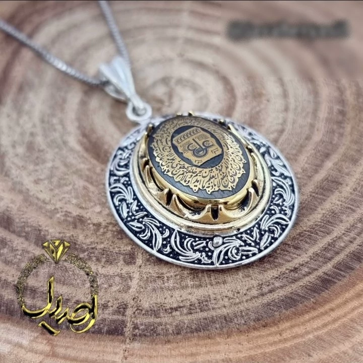 رکاب نقره طرح قلم زنجیرنقره اب رادیوم نگین حدید طلایی اصل وزن 18 گرم