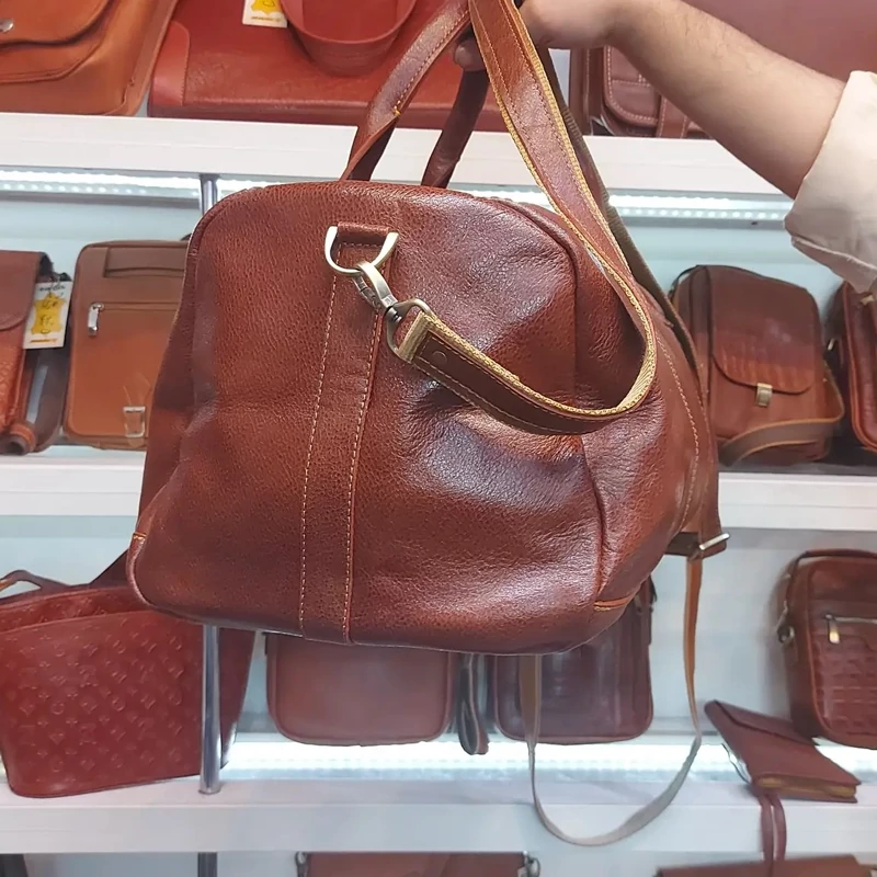 ساک ورزشی چرم طبیعی گاوی  عسلی