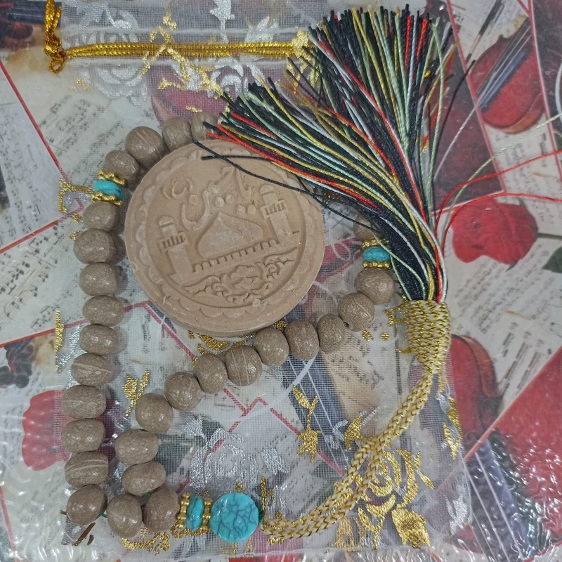 مهر و تسبیح تربت کربلا به همراه یک عدد کیسه توری