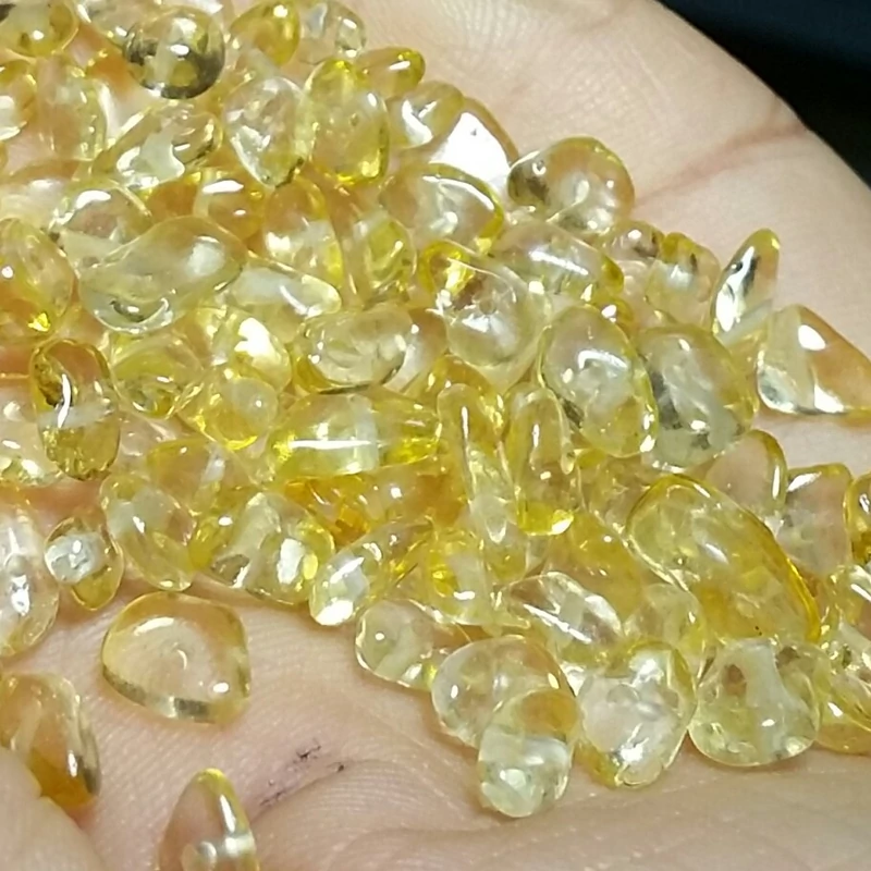 مهره چیپسی سنگ سیترین طبیعی وارداتی از کشور برزیل ریز قیمت برای یک عدد مهره درج شده است حراج واقعی