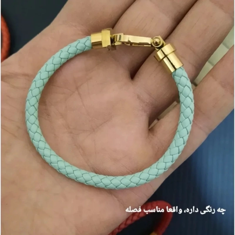 دستبند امگا فرد دخترانه با بند چرم بافت سبز روشن