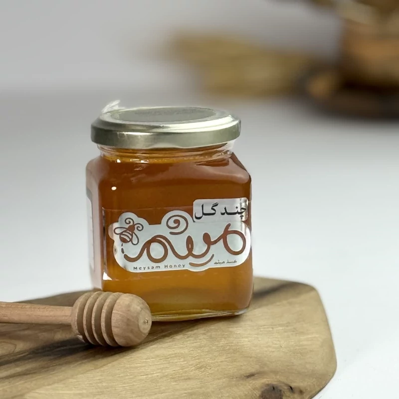 عسل طبیعی چندگل شیشه 900گرمی