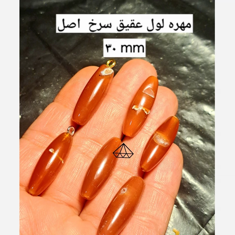اویز عقیق سرخ اصل اویز عقیق قرمز اصل مهره لول سلیمانی سرخ مهره لول عقیق مهره عقیق لوله ای سنگ مصور سر تسبیح عقیق سرخ