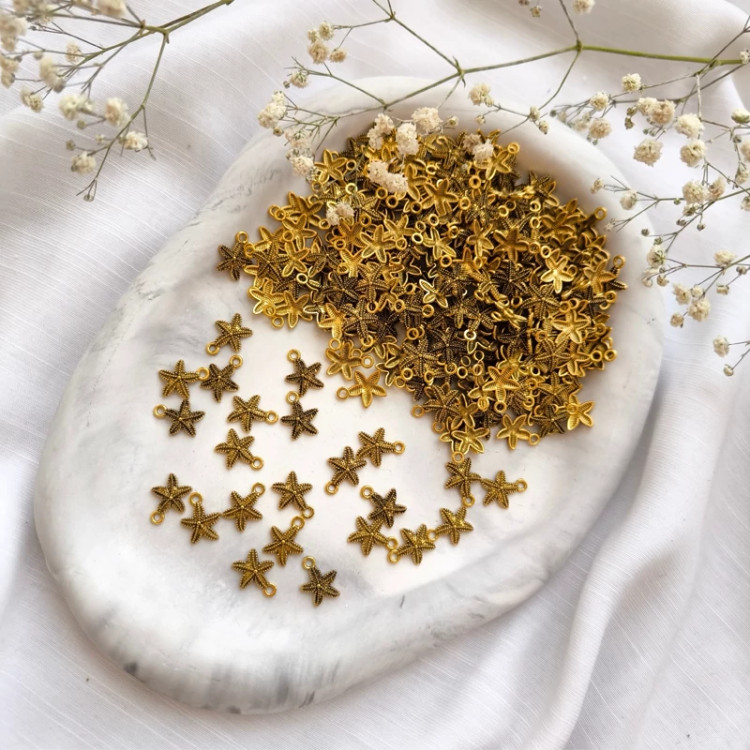 خرجکار آویز طرح ستاره دریایی ( فروش بصورت بسته 15 گرمی شامل 30 عدد آویز )