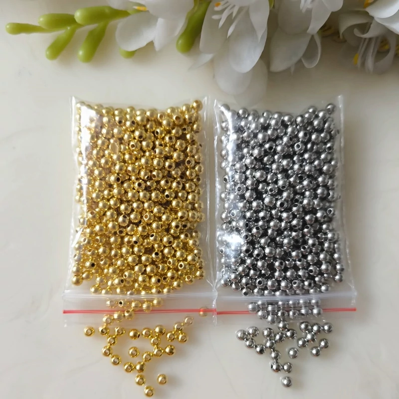 مروارید پلاستیکی طلایی و نقره ای سایز 4 (در بسته 15 گرمی)