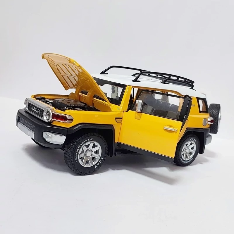 اسباب بازی ماشین فلزی اف جی کروزر FJ Cruiser ماکت فلزی زرد