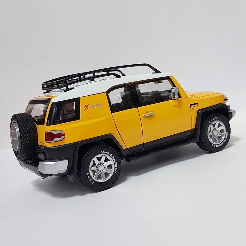 اسباب بازی ماشین فلزی اف جی کروزر FJ Cruiser ماکت فلزی زرد