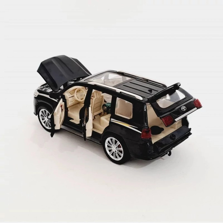 اسباب بازی ماشین فلزی تویوتا لندکروز دودزا مدل toyota land cruiser رنگ مشکی