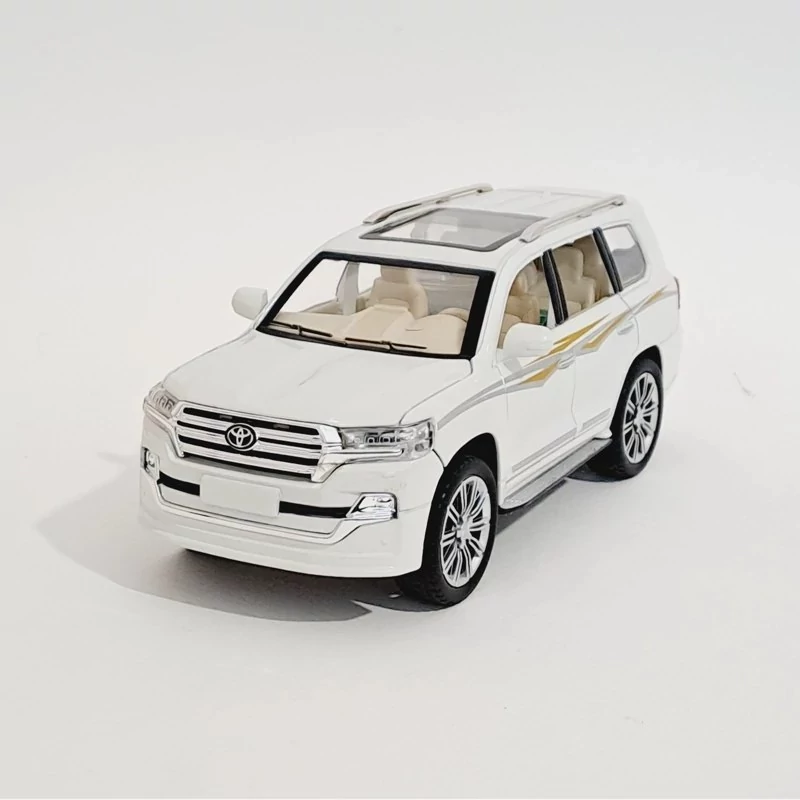 اسباب بازی ماشین فلزی تویوتا لندکروز دودزا مدل toyota land cruiser رنگ سفید