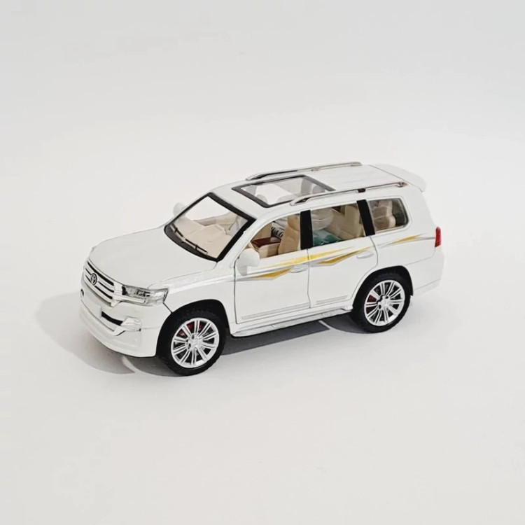 اسباب بازی ماشین فلزی تویوتا لندکروز دودزا مدل toyota land cruiser رنگ سفید