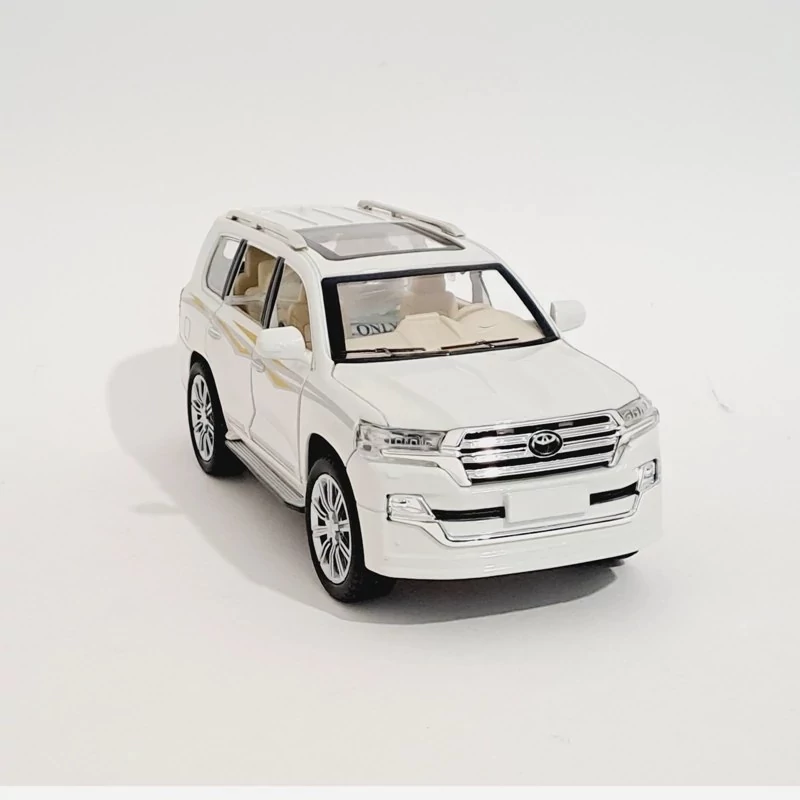 اسباب بازی ماشین فلزی تویوتا لندکروز دودزا مدل toyota land cruiser رنگ سفید