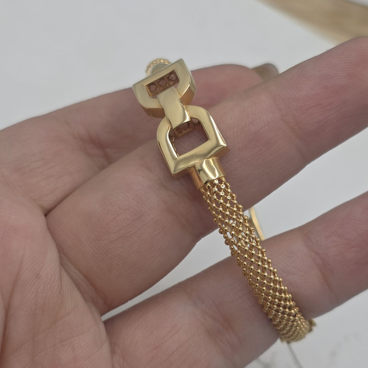 دستبند النگویی طلا کم اجرت 18 عیار زنانه طلا و شمش برلیان مدل Dior