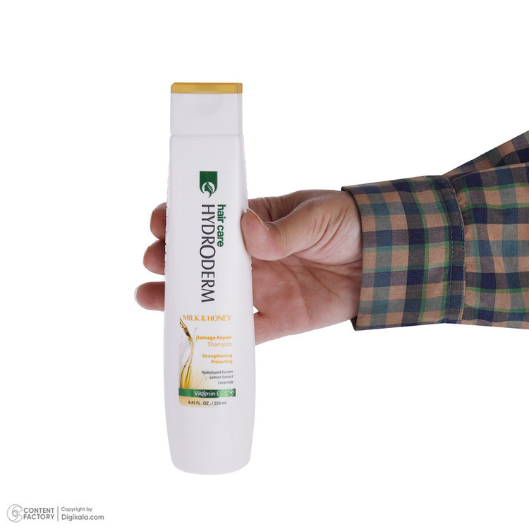 شامپو مو هیدرودرم مدل Milk and Honey حجم 250 میلیلیتر، تقویتکننده، ترمیمکننده، براق کننده، مناسب موهای آسیب دیده، حاو...