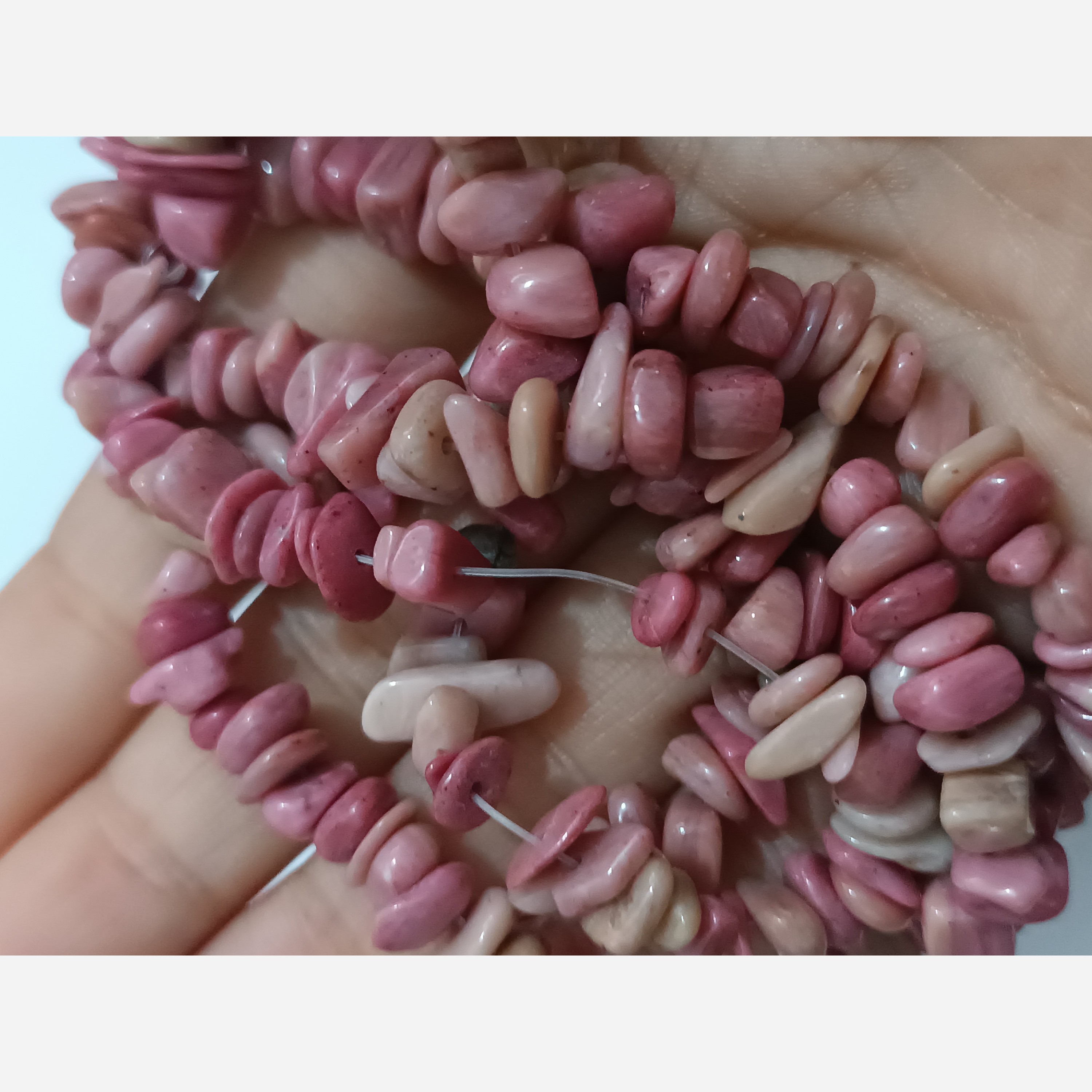 مهره سنگ رودونیت دفرمه اصل و معدنی