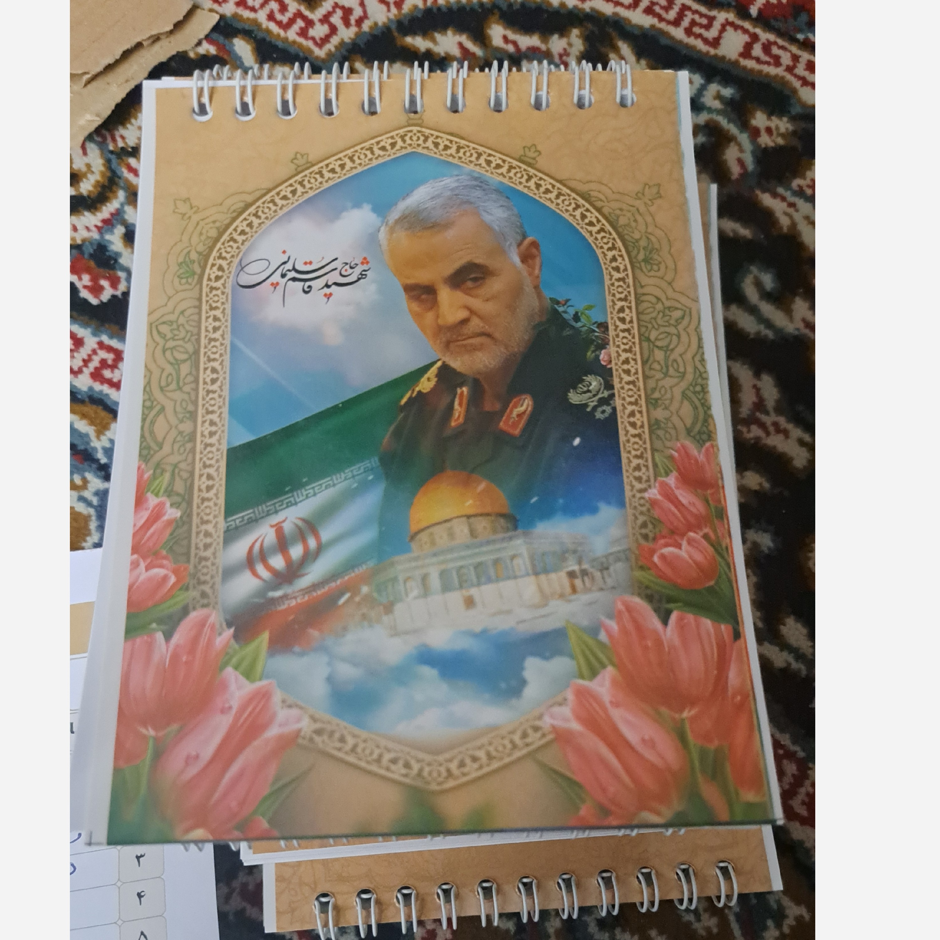 دفترچه طرح شهدا خط دار سیمی اندازه 15 در 10 سانت خط دار 50 برگ هدایای فرهنگی جشن عبادت یادواره شهدا شهدای جنگ اخیر